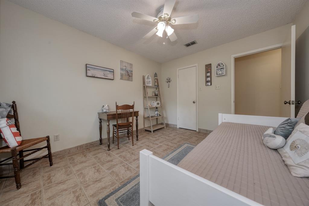 1649 Morningside Trail Hideaway, TX 75771 - Photo 34 of 40 a living room with furniture and a dining table