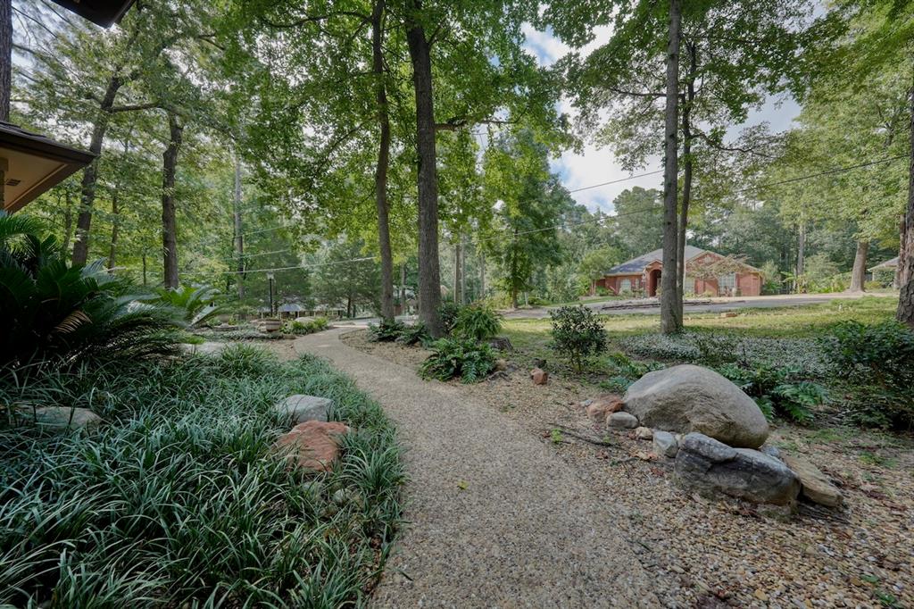 1649 Morningside Trail Hideaway, TX 75771 - Photo 38 of 40 a backyard of a house with a yard and outdoor seating