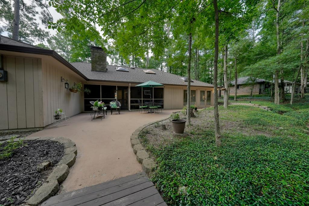 1649 Morningside Trail Hideaway, TX 75771 - Photo 40 of 40 a house view with a garden space