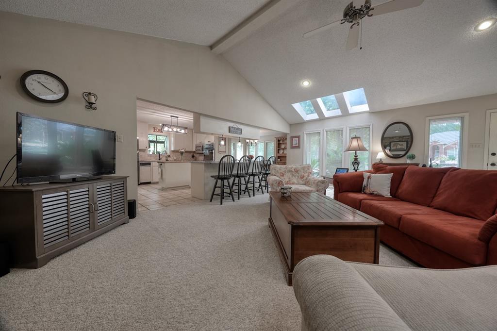 1649 Morningside Trail Hideaway, TX 75771 - Photo 5 of 40 a living room with furniture and a flat screen tv