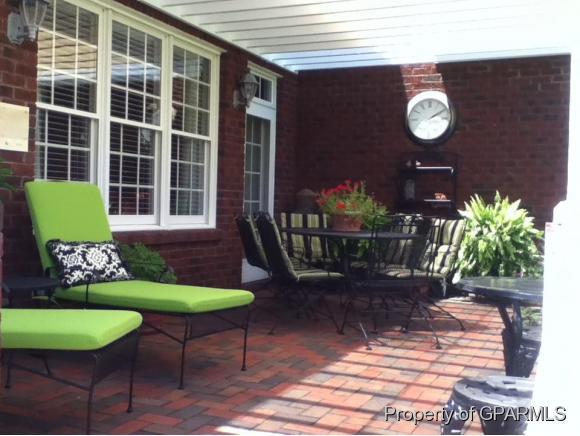 2759 Alton Phillips Road Kinston, NC 28504 - Photo 16 of 50 Covered, raised brick patio