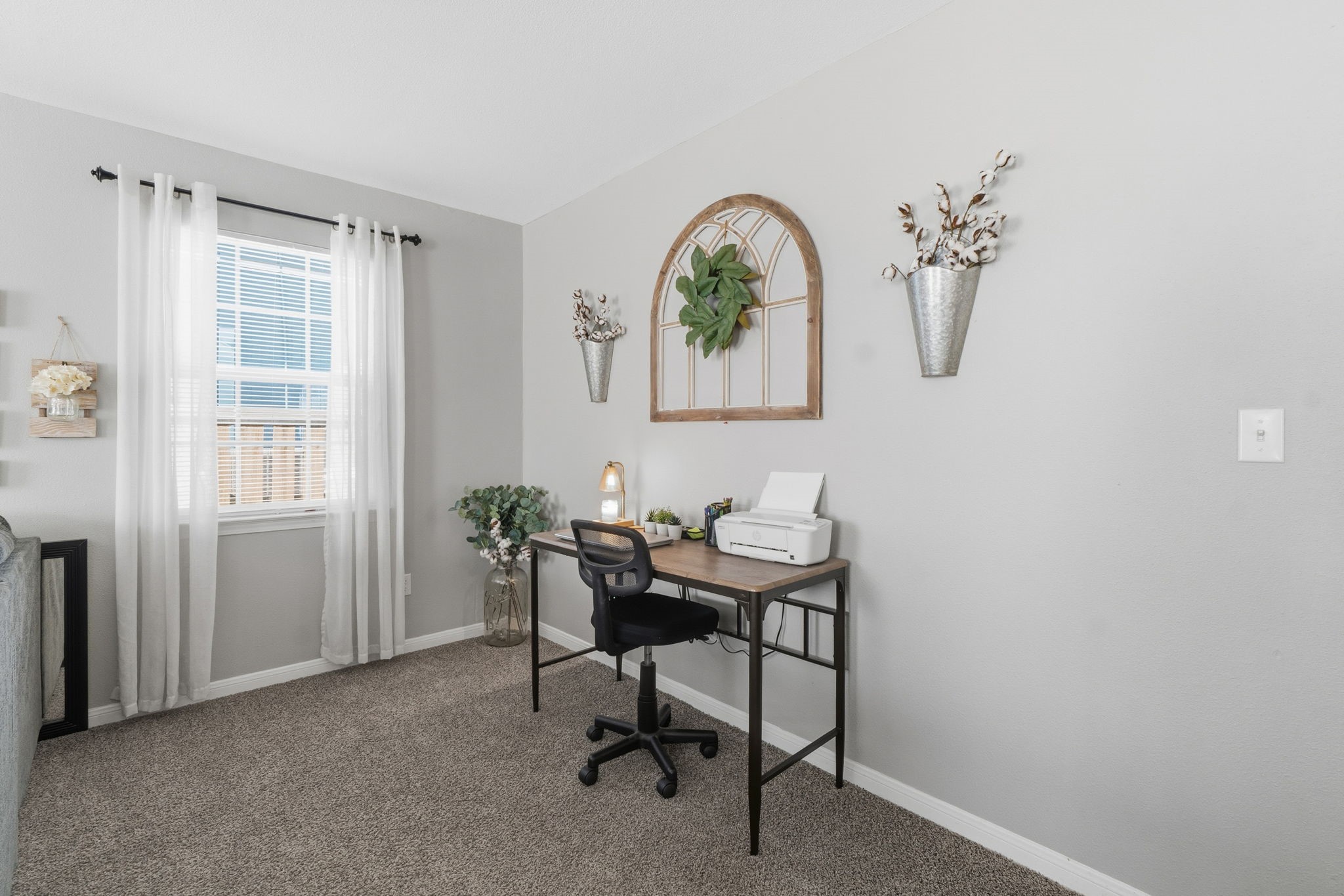 192 Miller Road Livingston, TX 77351 - Photo 12 of 36 a view of a workspace with furniture and a window