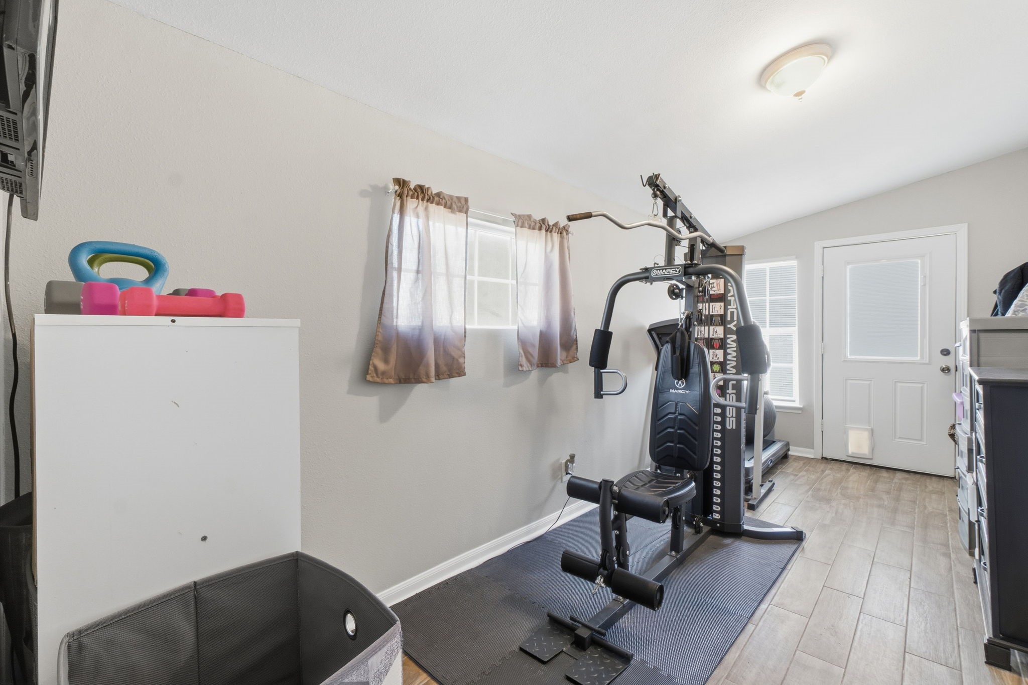 192 Miller Road Livingston, TX 77351 - Photo 16 of 36 a view of a room with gym equipment