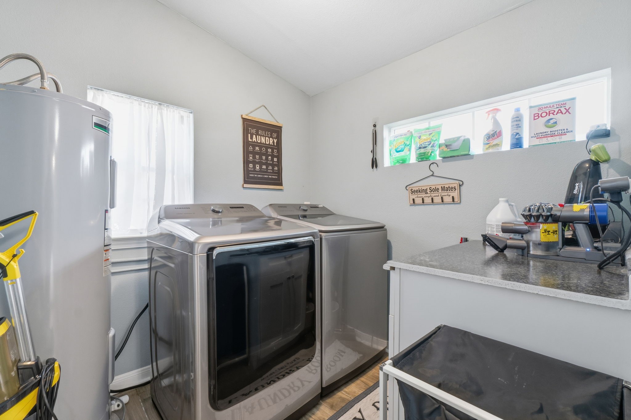 192 Miller Road Livingston, TX 77351 - Photo 17 of 36 a view of a kitchen with fridge and wooden floor
