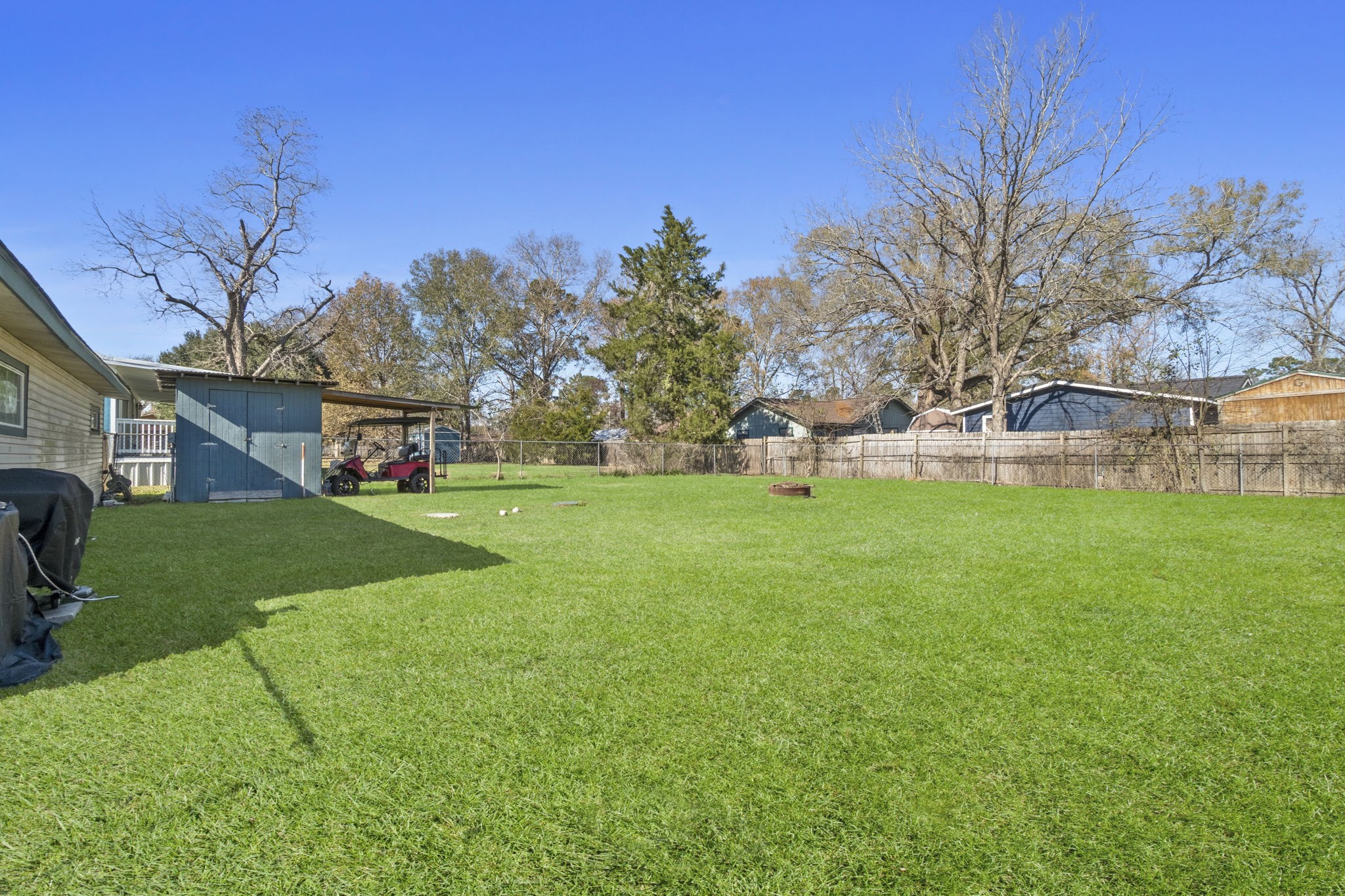 192 Miller Road Livingston, TX 77351 - Photo 22 of 36 a view of a house with a yard