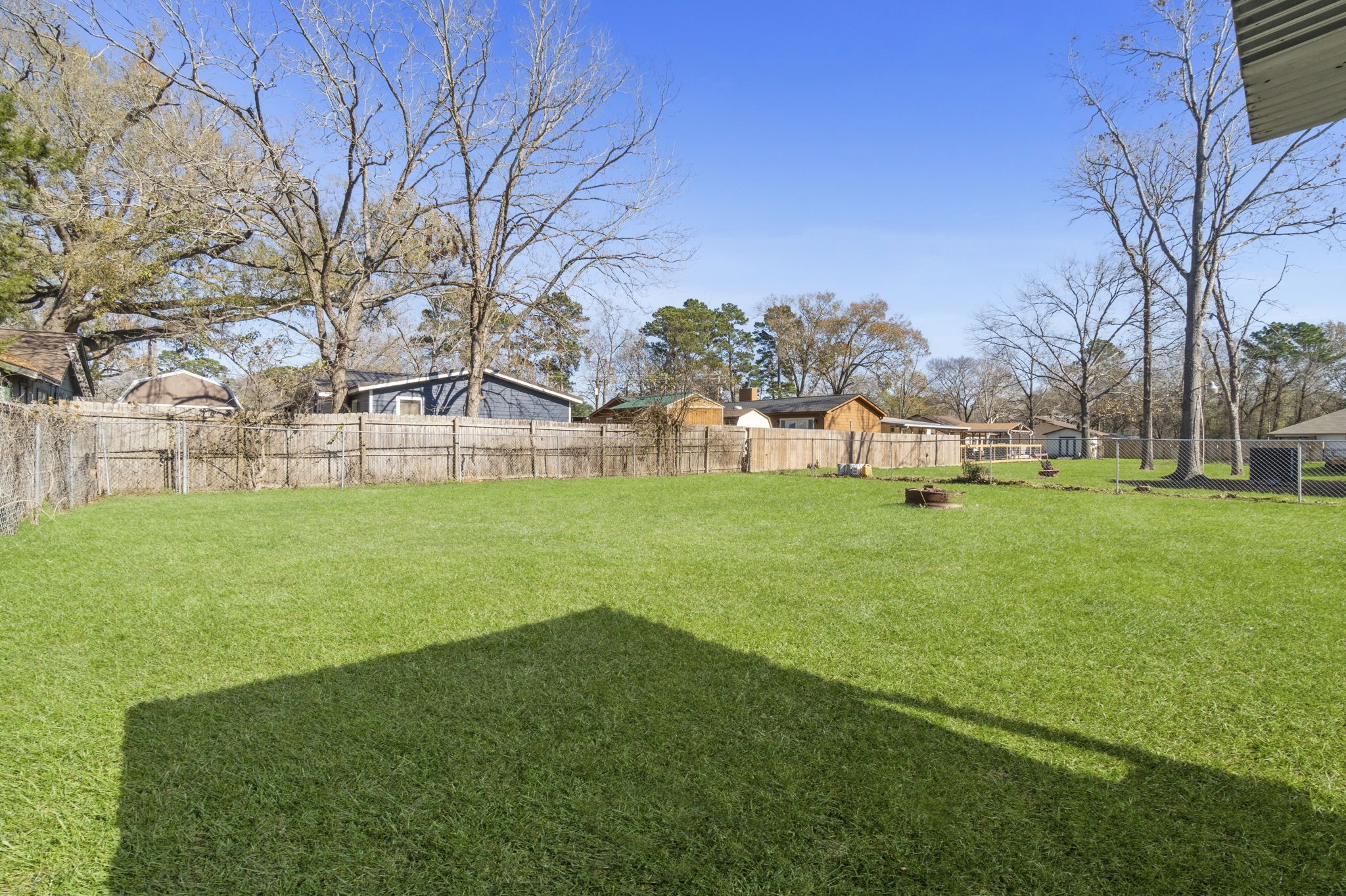 192 Miller Road Livingston, TX 77351 - Photo 23 of 36 a view of a house with a backyard