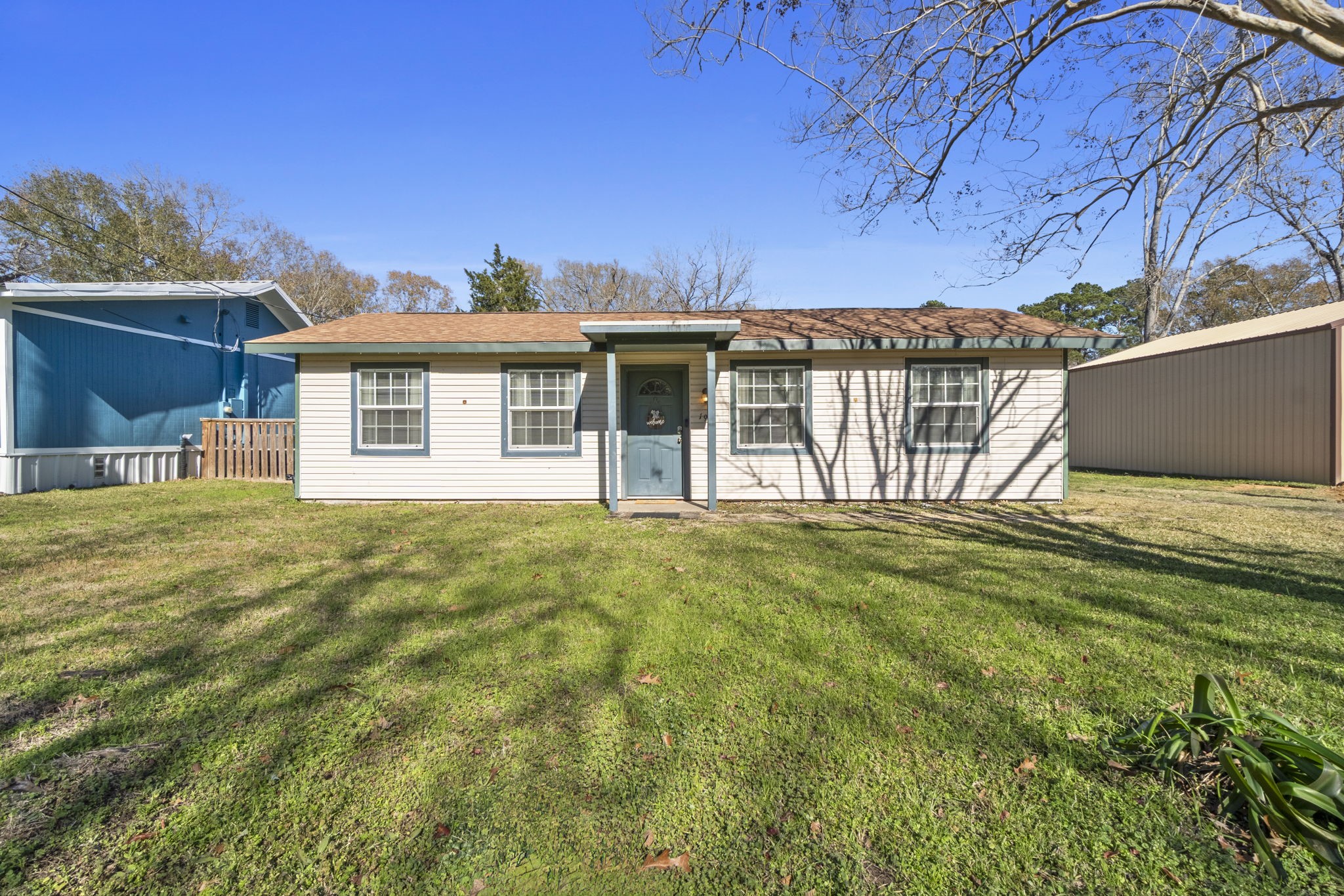 192 Miller Road Livingston, TX 77351 - Photo 29 of 36 a view of a house with a backyard