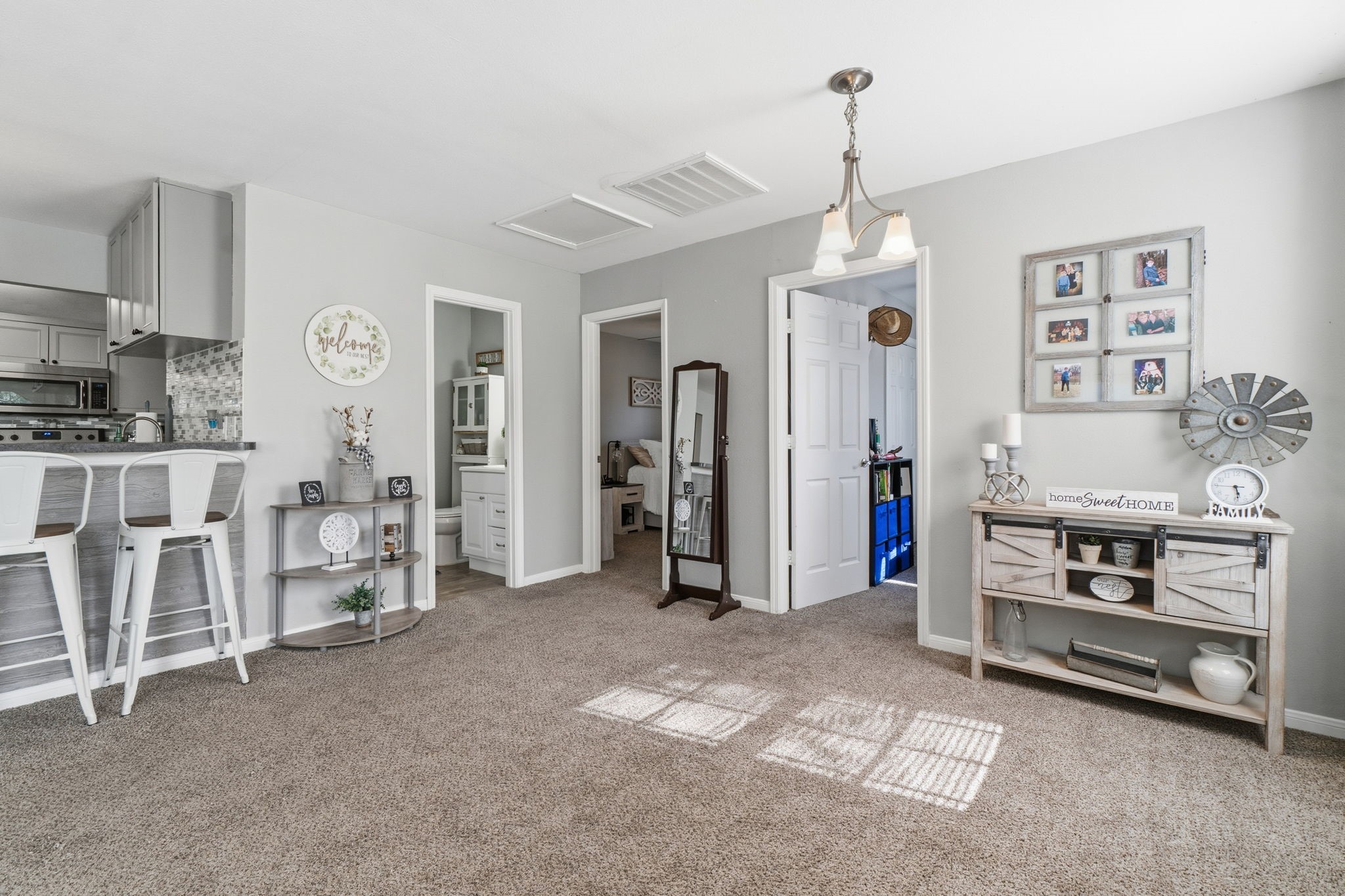 192 Miller Road Livingston, TX 77351 - Photo 7 of 36 a view of a livingroom with furniture and windows
