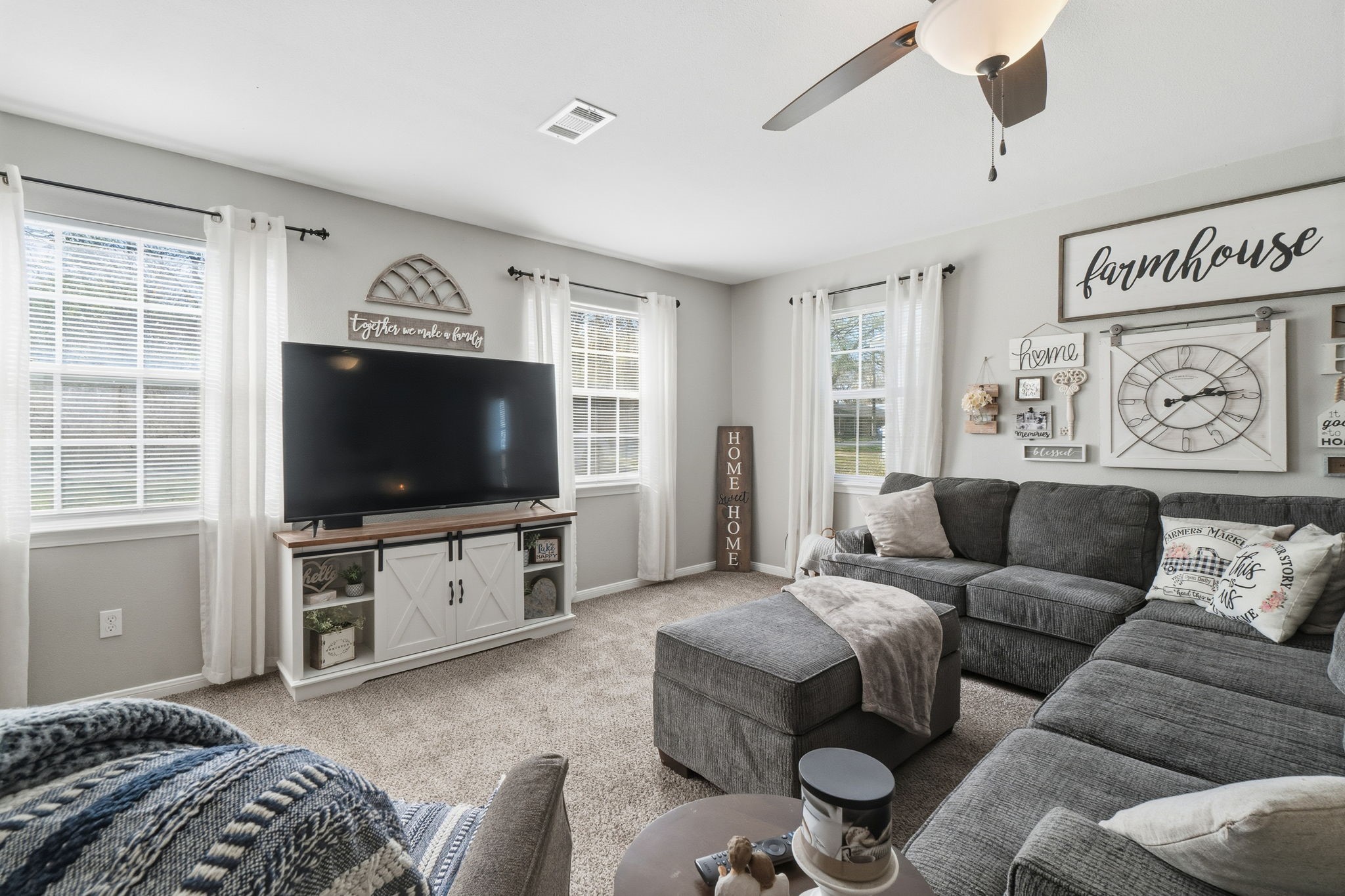 192 Miller Road Livingston, TX 77351 - Photo 9 of 36 a living room with furniture and a flat screen tv