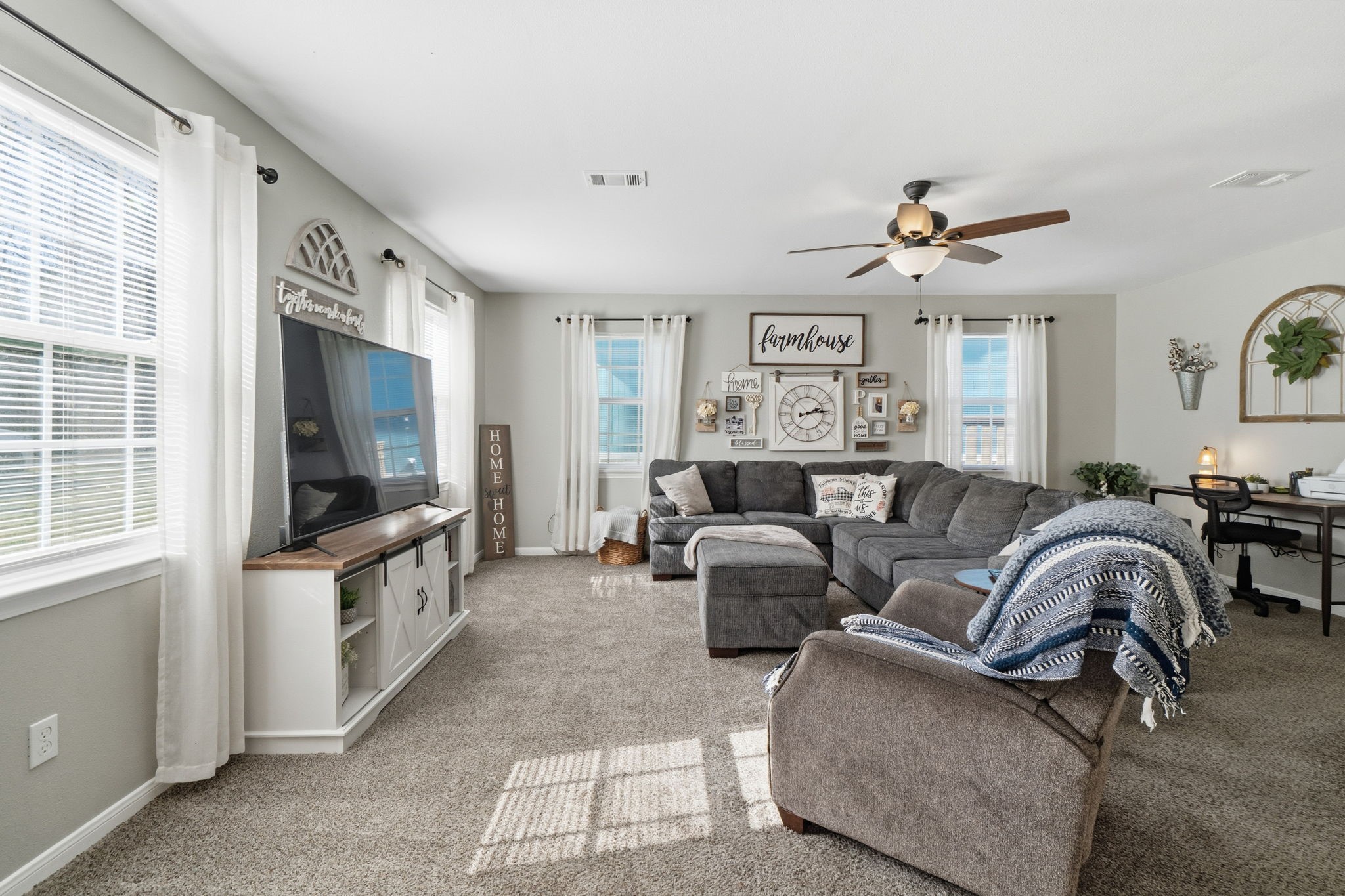 192 Miller Road Livingston, TX 77351 - Photo 10 of 36 a living room with furniture and a flat screen tv