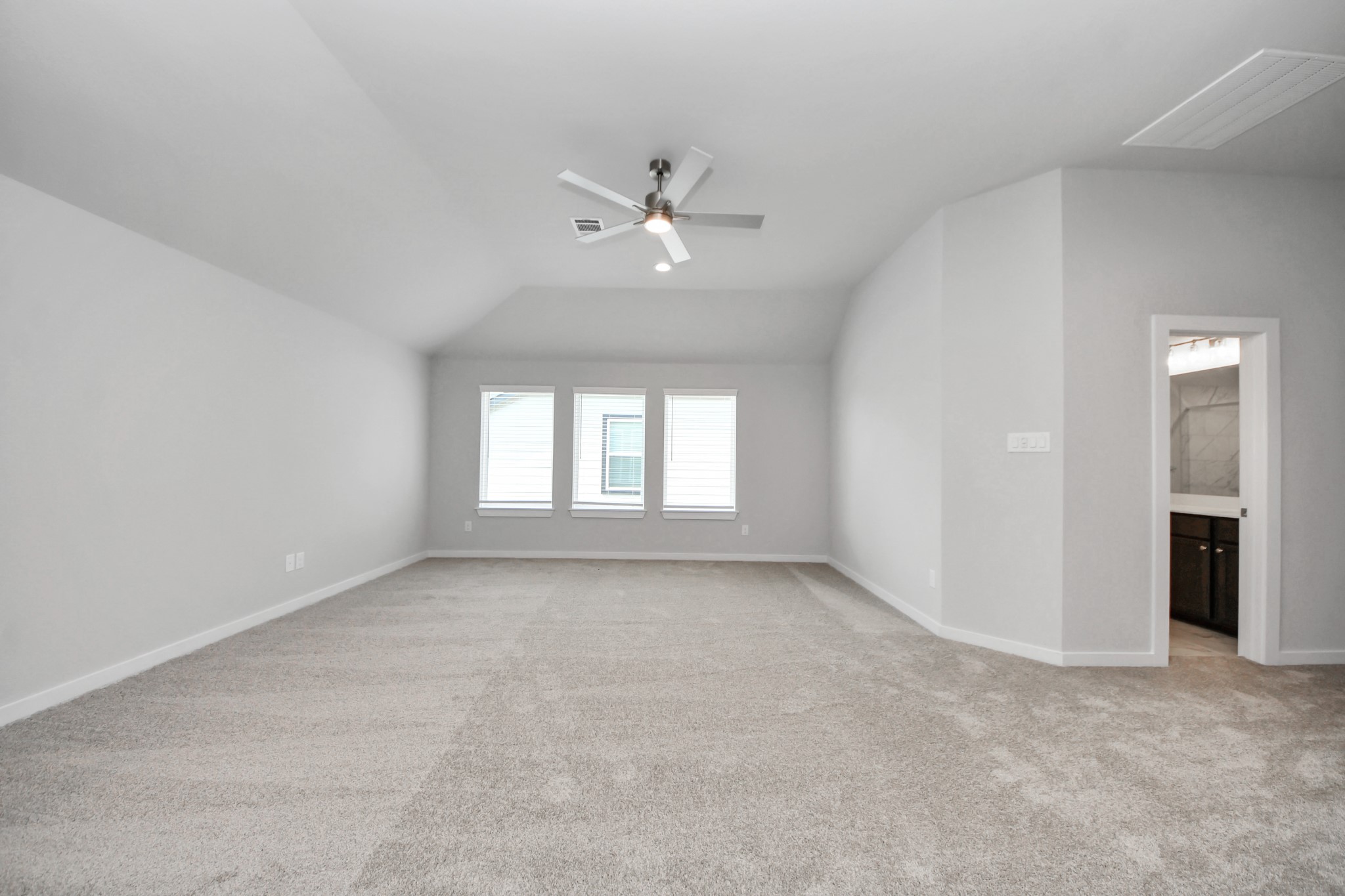 3110 Native Spg Drive Spring, TX 77373 - Photo 24 of 34 Come upstairs and enjoy a day of leisure in this fabulous game room! This is the perfect hangout spot or adult game room! Features plush carpet, high ceilings, custom paint and windows for plenty of natural light. Sample photo of completed home with similar floor plan. Actual colors and selections may vary.