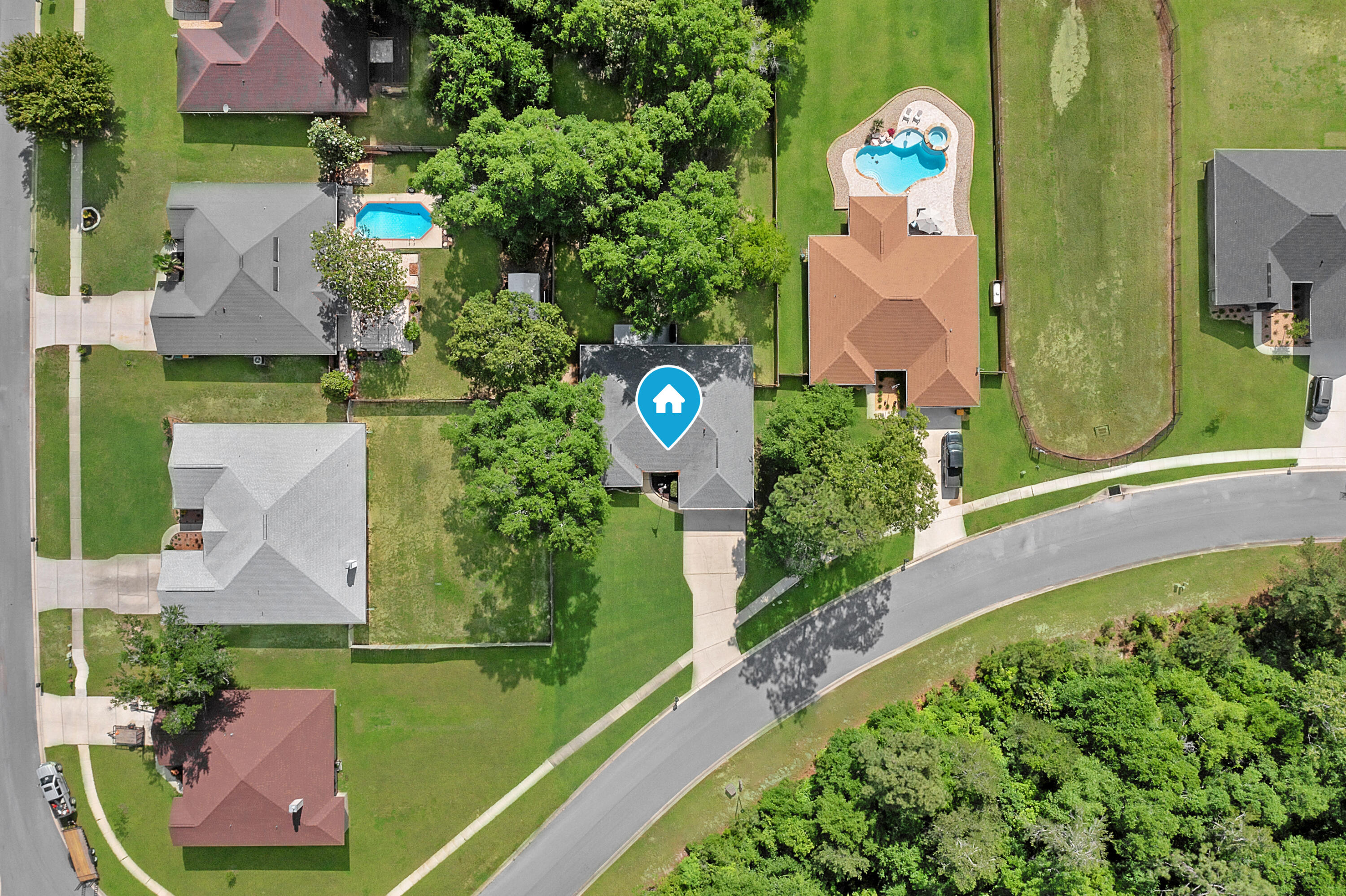 2389 Genevieve Way Crestview, FL 32536 - Photo 12 of 44 an aerial view of a house with a garden and yard