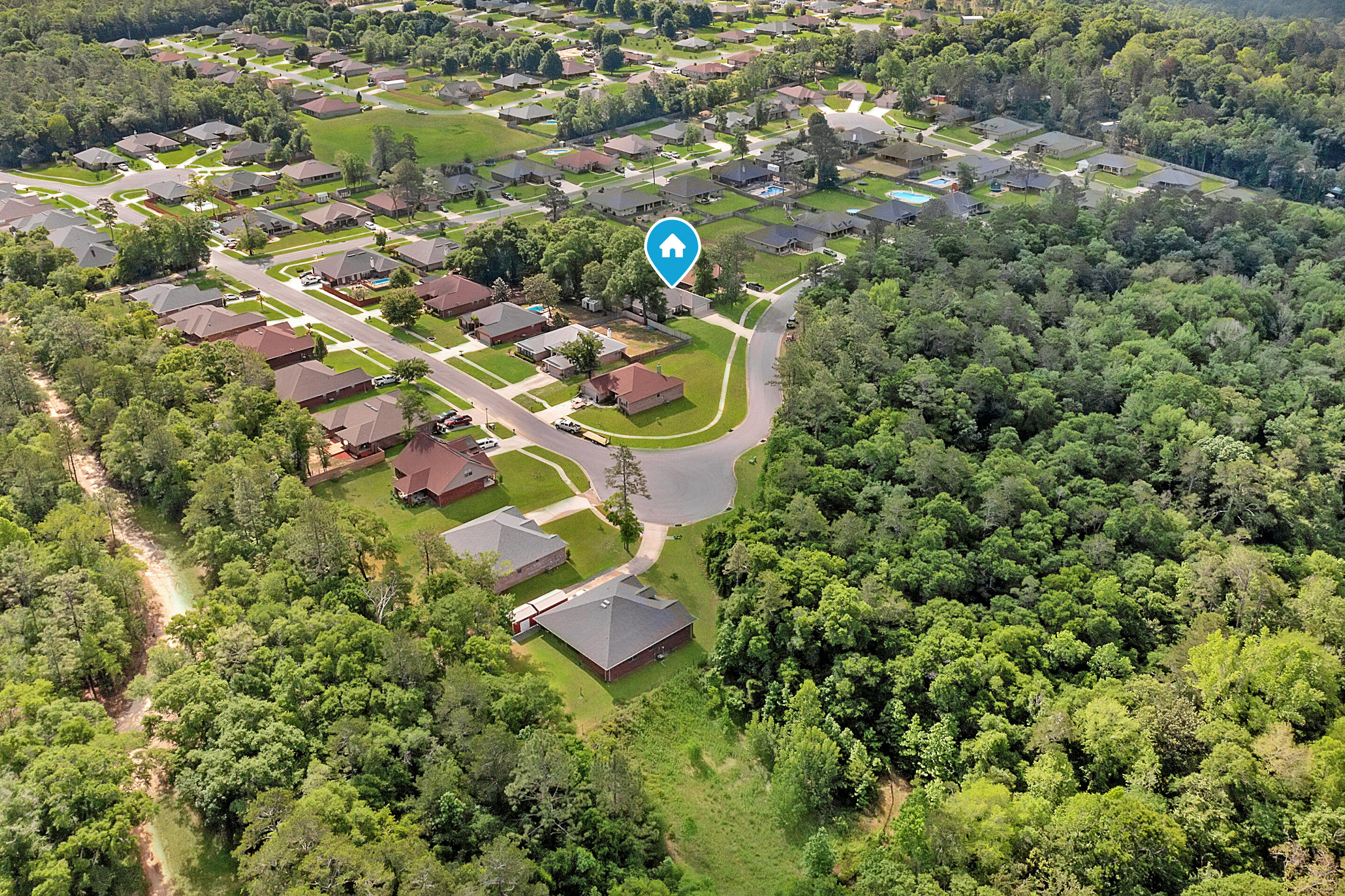 2389 Genevieve Way Crestview, FL 32536 - Photo 13 of 44 an aerial view of a house with a yard and street view