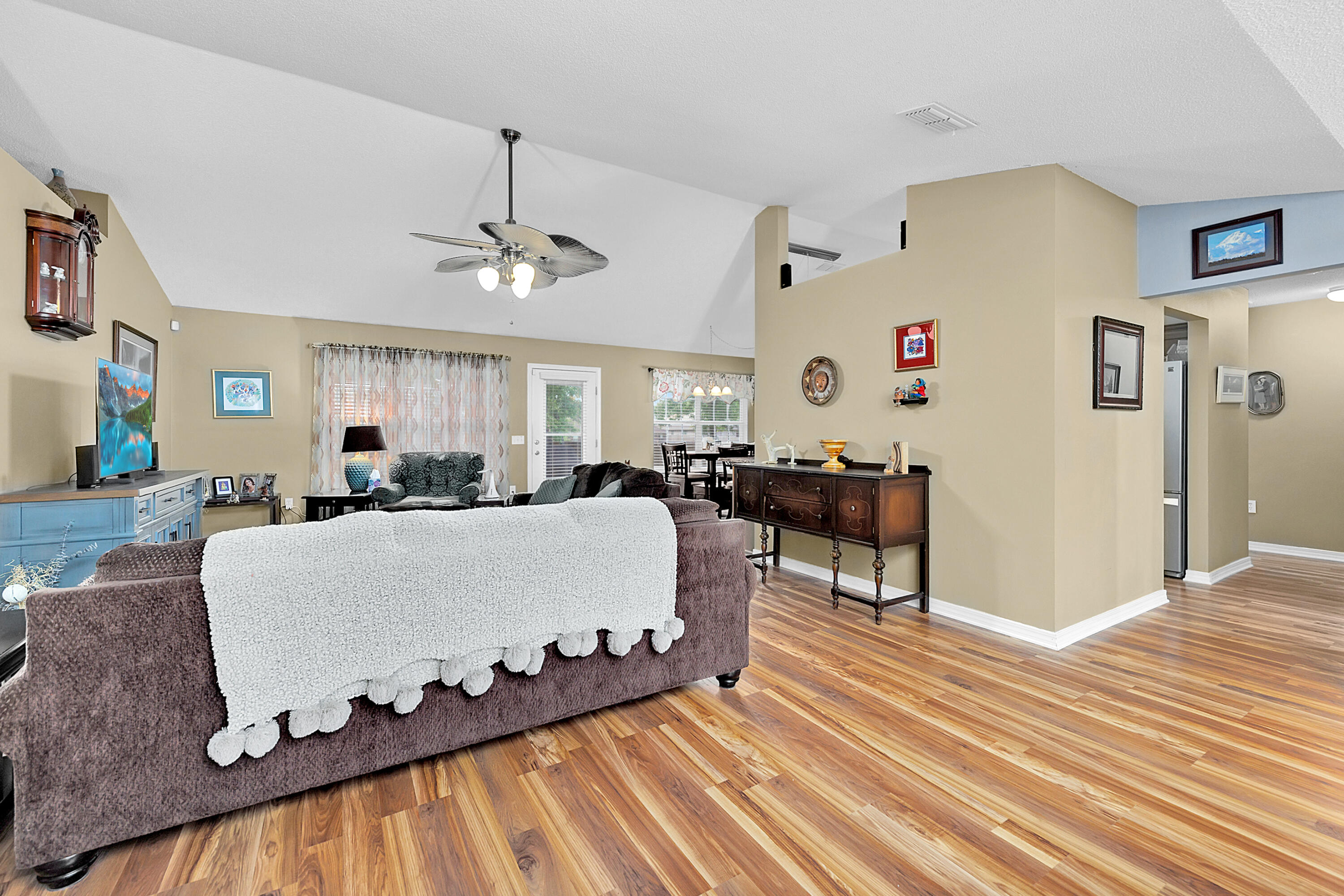 2389 Genevieve Way Crestview, FL 32536 - Photo 14 of 44 a living room with furniture and kitchen view