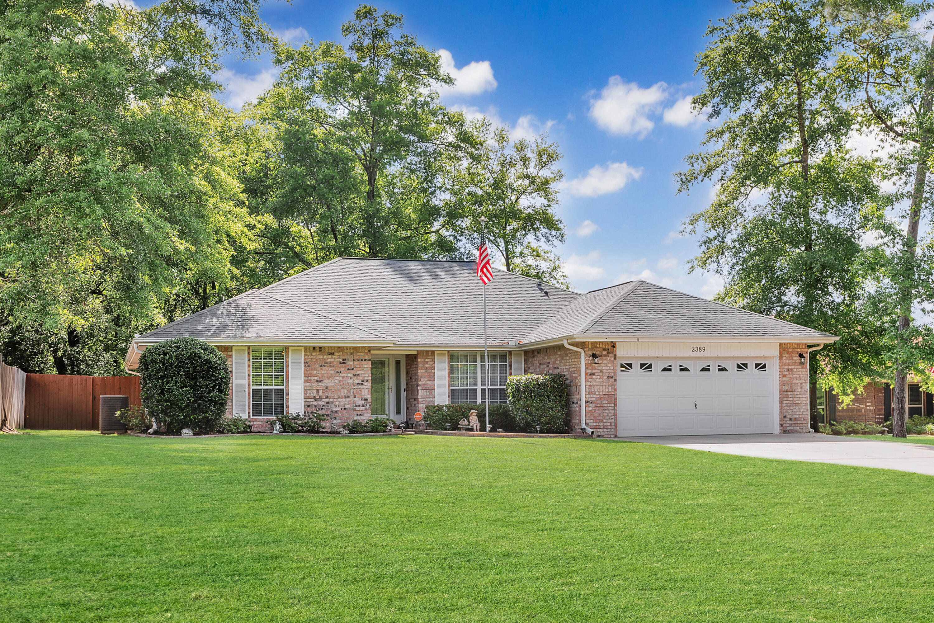 2389 Genevieve Way Crestview, FL 32536 - Photo 2 of 44 a view of a house with a yard