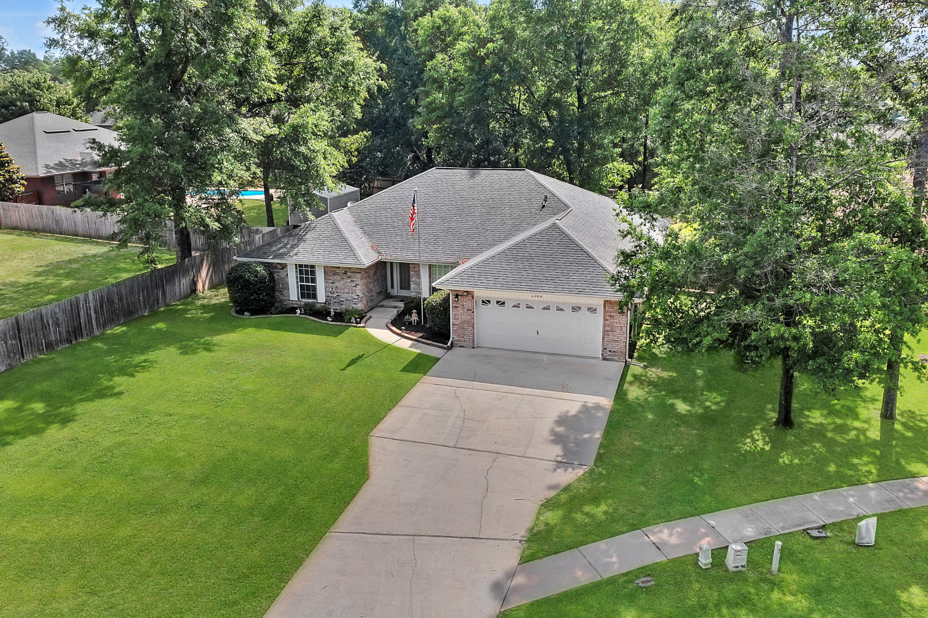 2389 Genevieve Way Crestview, FL 32536 - Photo 3 of 44 a aerial view of a house with yard and green space