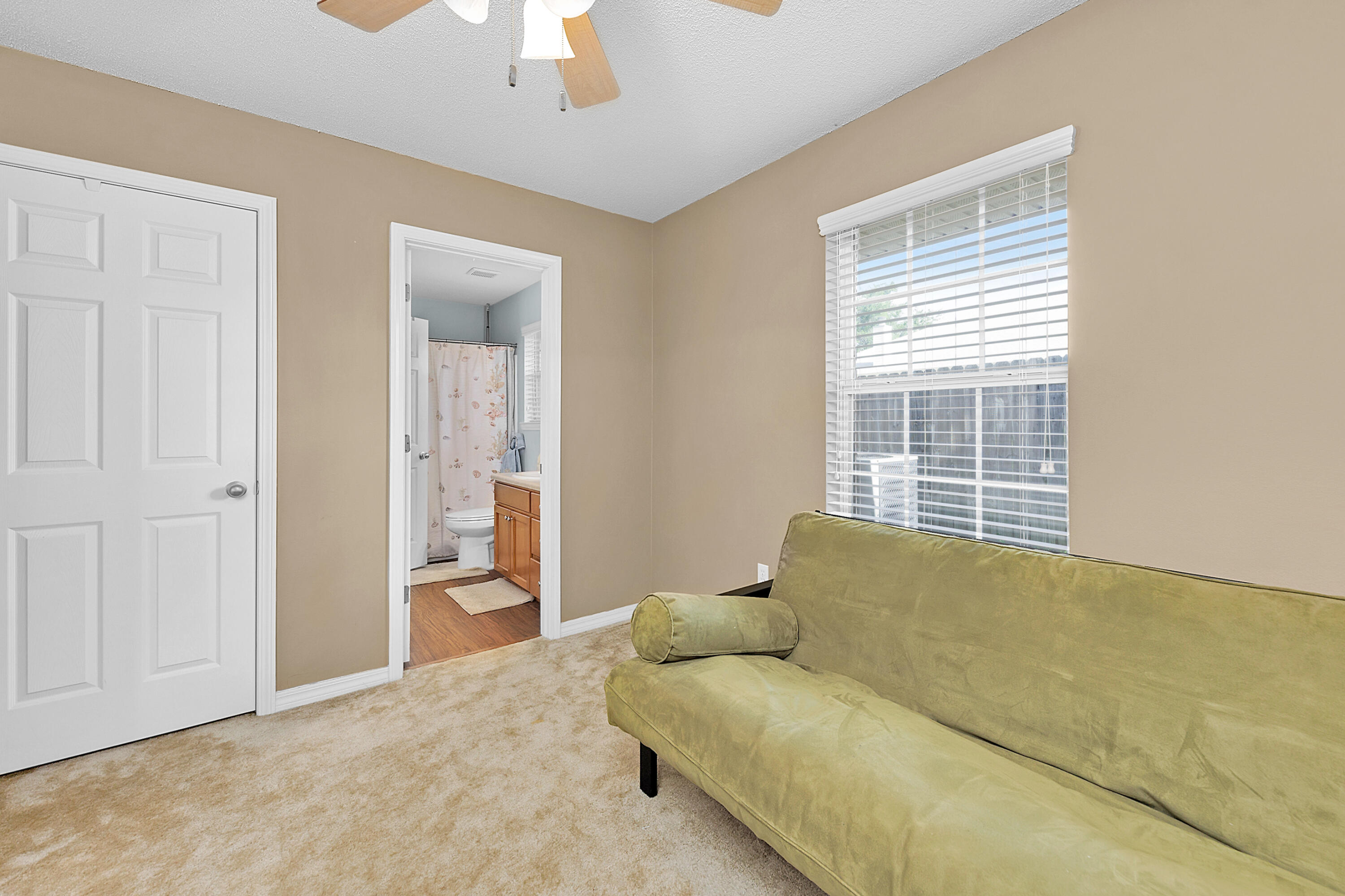 2389 Genevieve Way Crestview, FL 32536 - Photo 33 of 44 a living room with furniture and a window