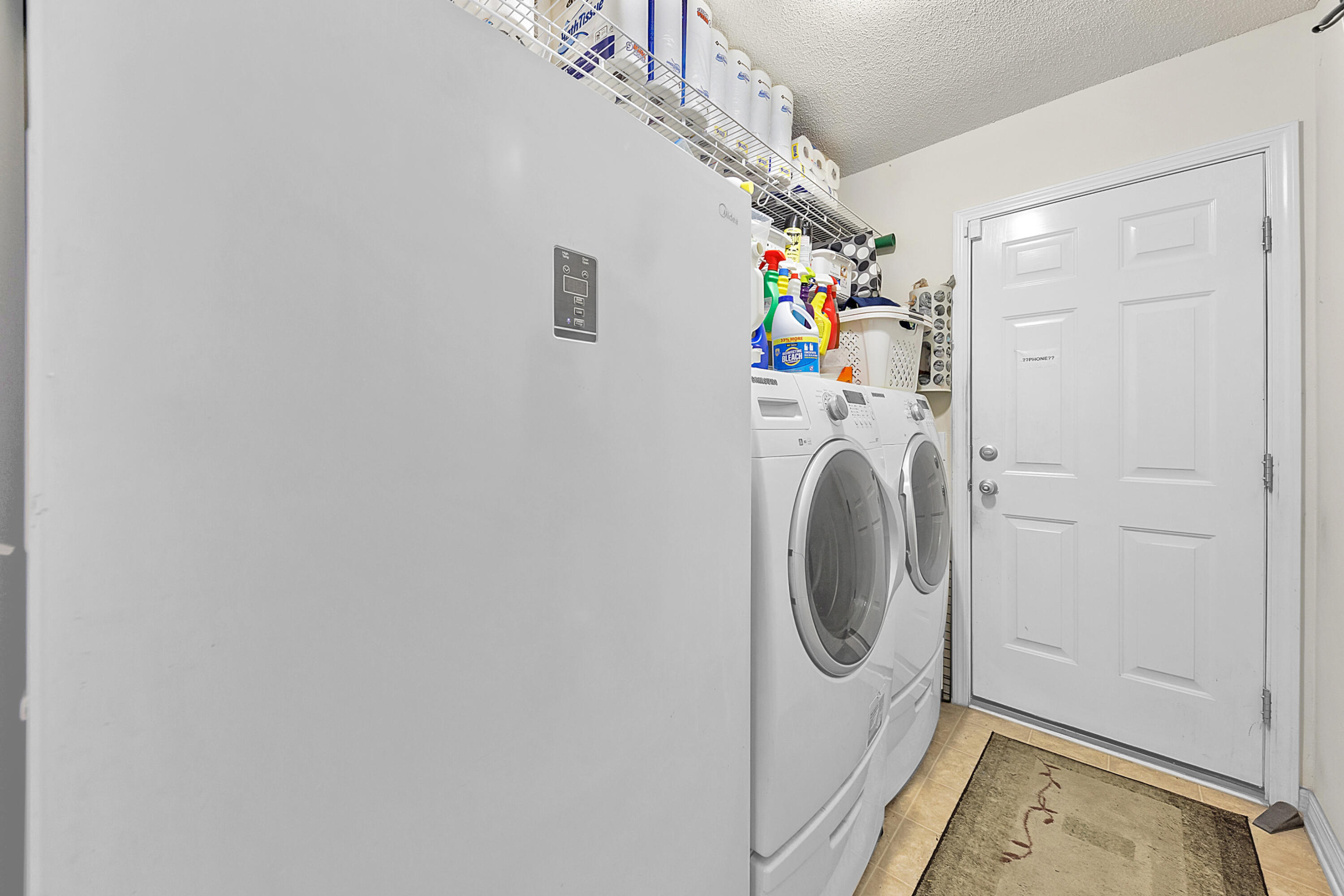 2389 Genevieve Way Crestview, FL 32536 - Photo 34 of 44 a utility room with dryer and washer