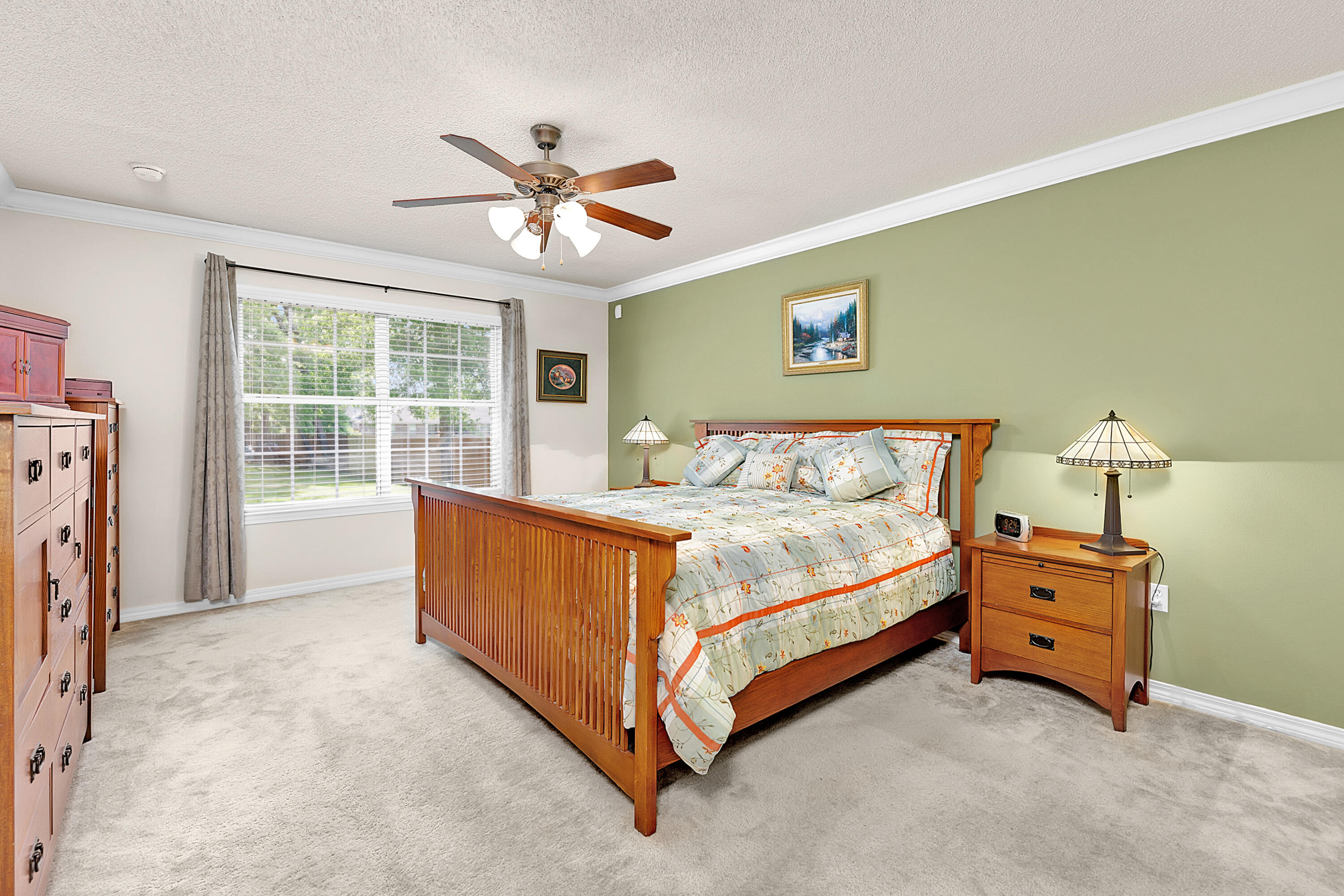 2389 Genevieve Way Crestview, FL 32536 - Photo 35 of 44 a bed room with a bed and a window