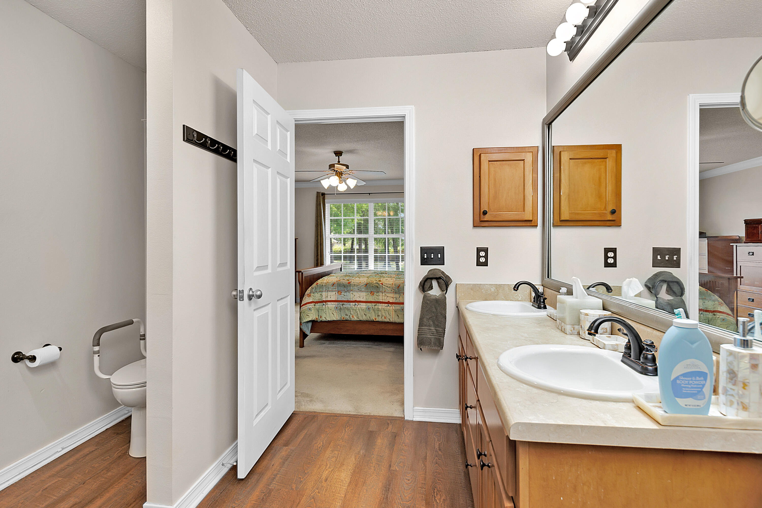2389 Genevieve Way Crestview, FL 32536 - Photo 39 of 44 a en suite bathroom with a sink double vanity and a tub