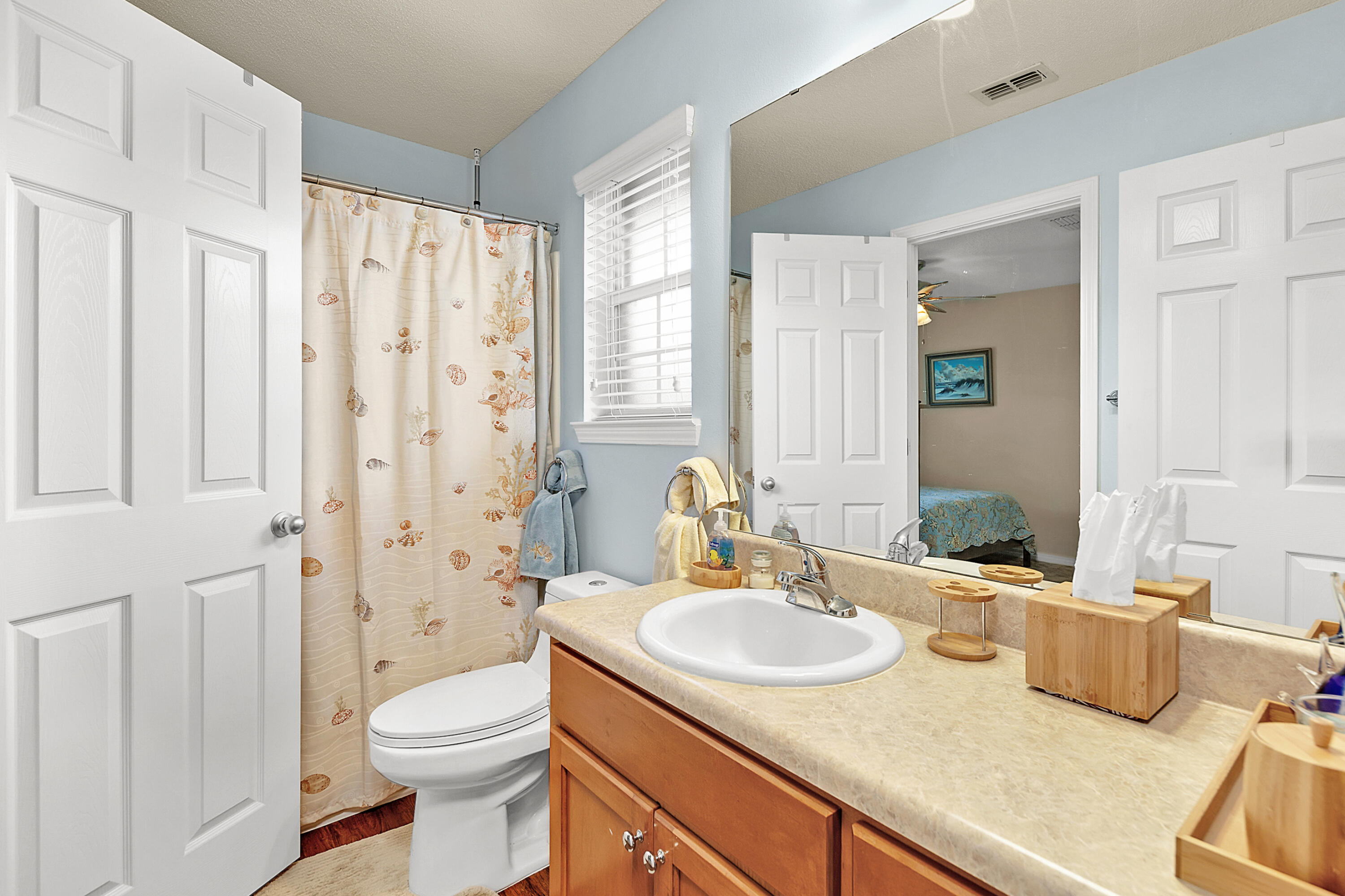 2389 Genevieve Way Crestview, FL 32536 - Photo 42 of 44 a bathroom with a sink toilet and shower