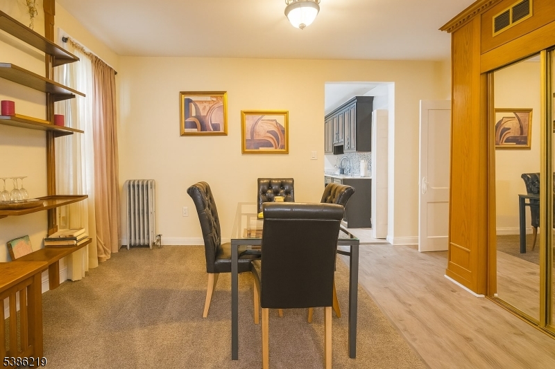 26 Harding Terrace, Unit 1 Newark, NJ 07112 - Photo 5 of 12 a workspace with furniture and wooden floor