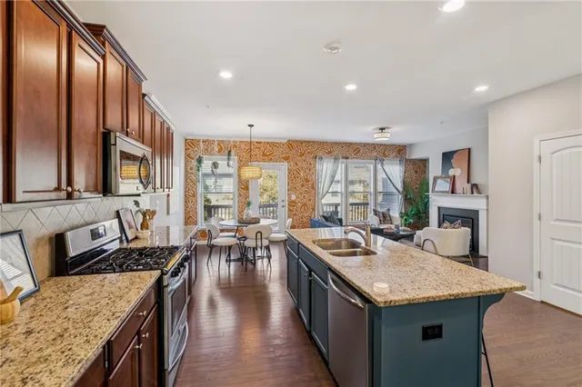 a kitchen with granite countertop lots of counter top space
