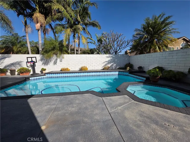 a bathroom with a shower and a bath tub