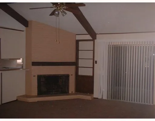 a living room with a fireplace