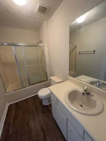 a bathroom with a sink and a toilet