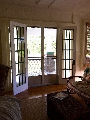 252 Kini Road Mountain View, HI 96771 - Photo 1 of 2 a bedroom with a bed and a window