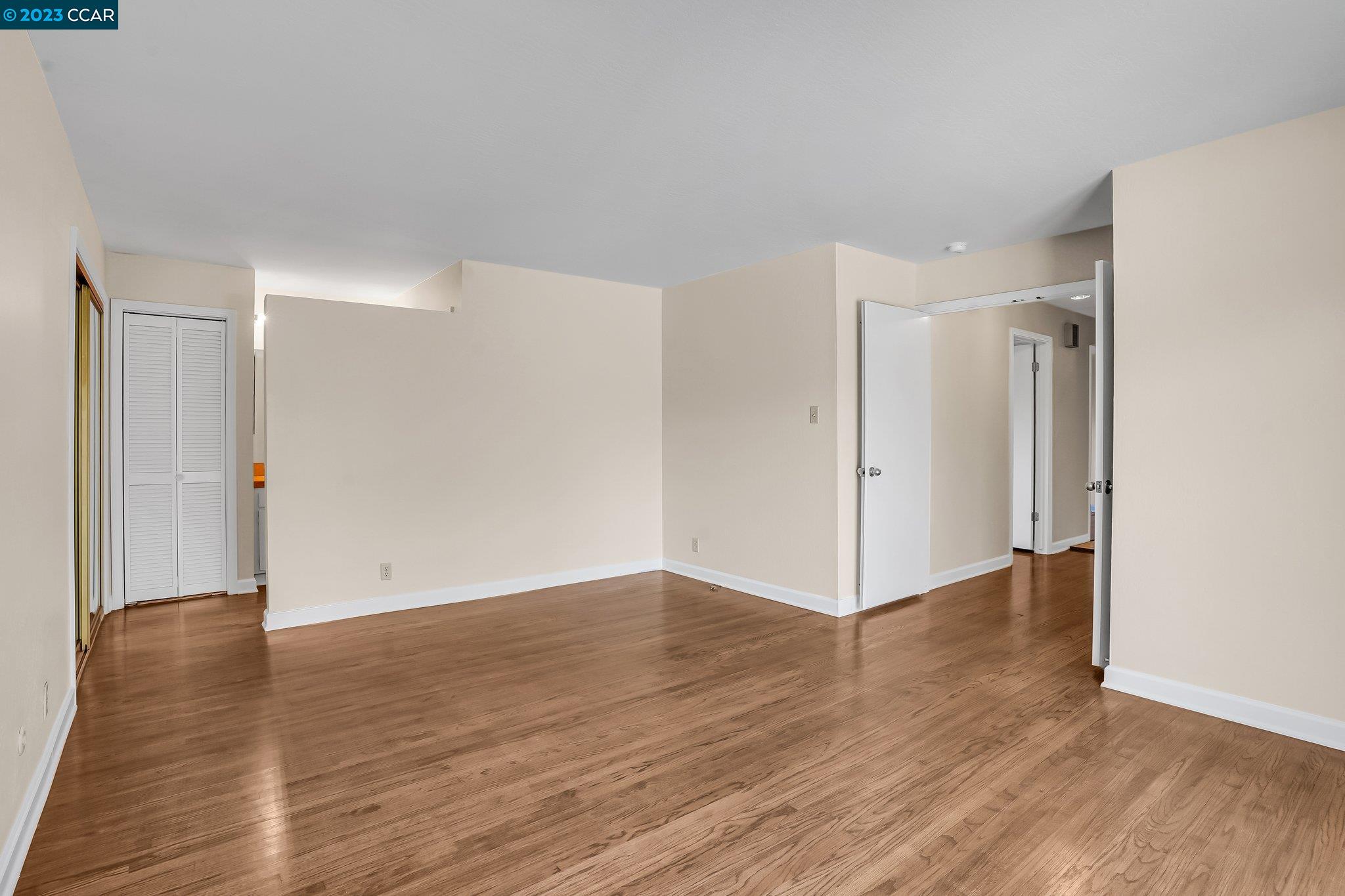 348 Barrett Circle Danville, CA 94526 - Photo 25 of 41 a view of an empty room with wooden floor
