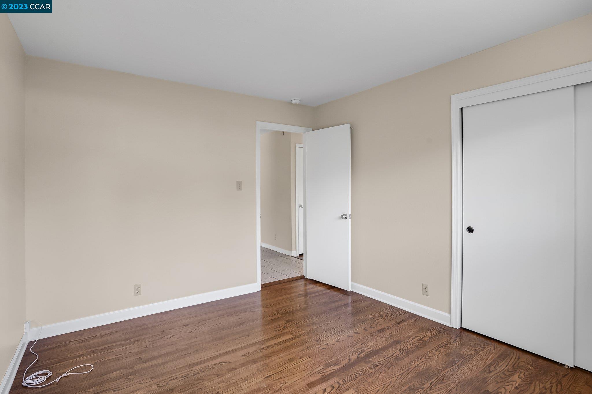 348 Barrett Circle Danville, CA 94526 - Photo 29 of 41 a view of an empty room with wooden floor