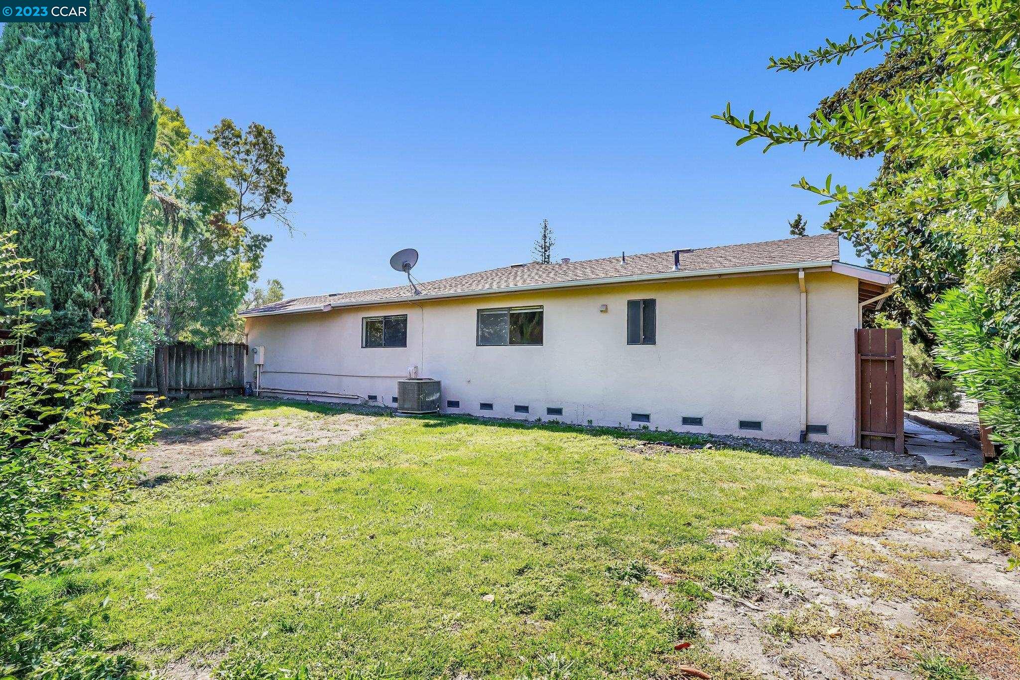 348 Barrett Circle Danville, CA 94526 - Photo 36 of 41 a backyard of a house with lots of green space