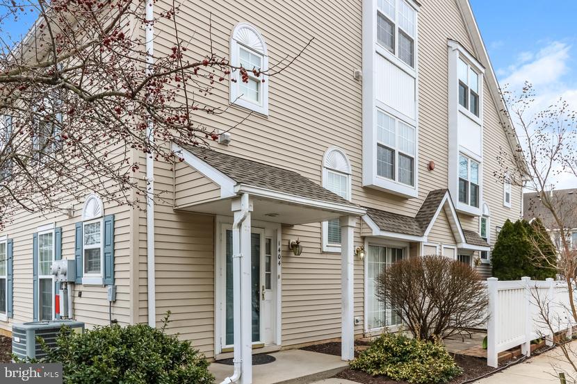 a view of a building with a tree