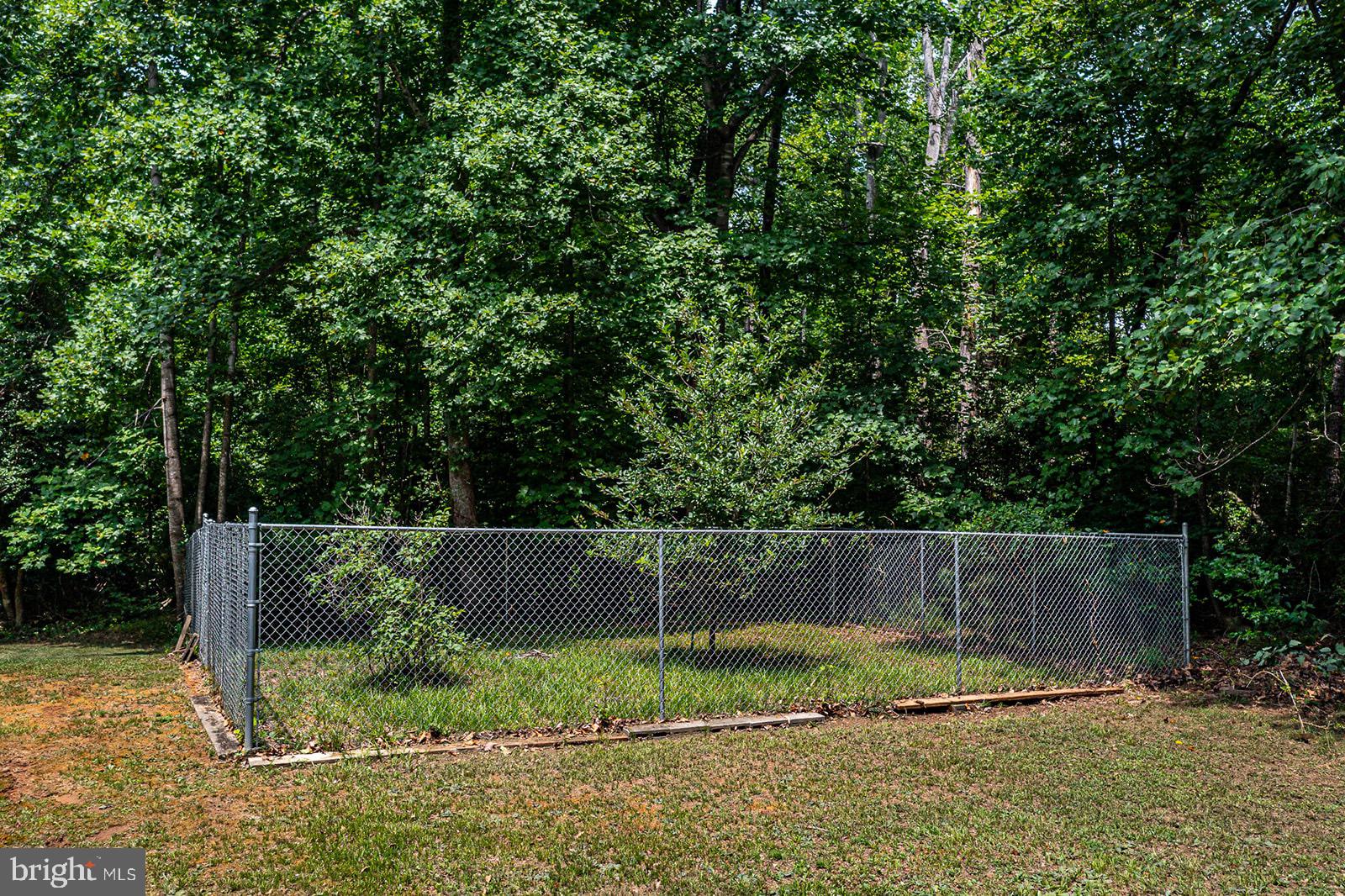 49 Marina Road Lancaster, VA 22503 - Photo 54 of 66 Fenced pet enclosure