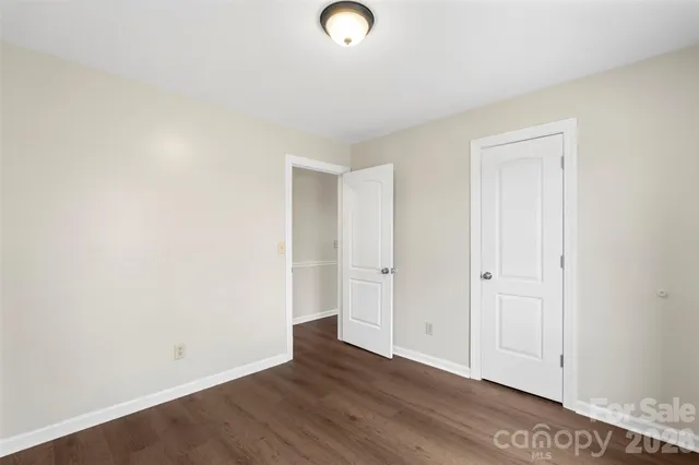 a kitchen with stainless steel appliances granite countertop a stove a refrigerator and a sink