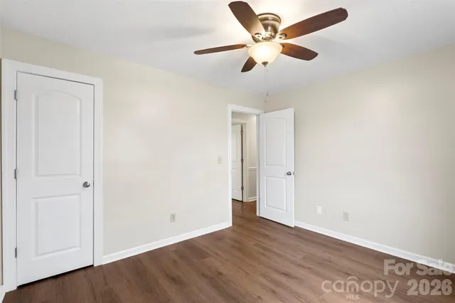 a bathroom with a toilet sink shower and mirror