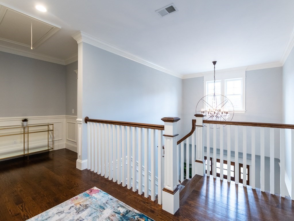 1708 Great Plain Avenue Needham, MA 02492 - Photo 12 of 34 a view of entryway with wooden floor