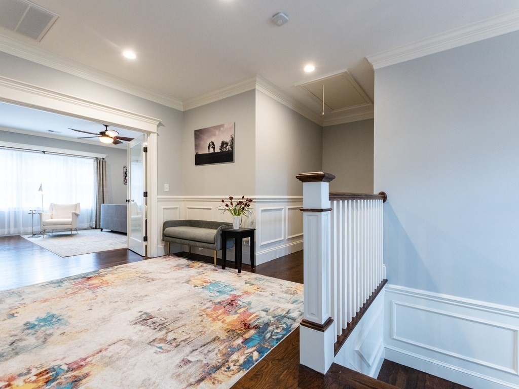 1708 Great Plain Avenue Needham, MA 02492 - Photo 13 of 34 a bedroom with a bed and a view of kitchen