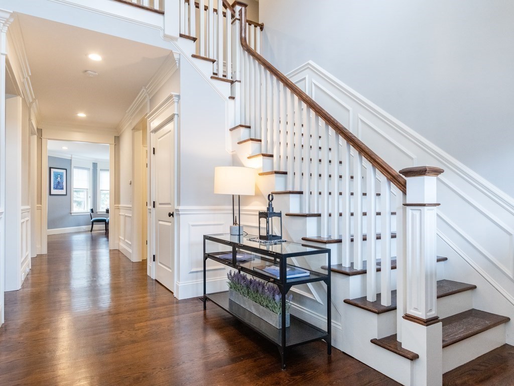 1708 Great Plain Avenue Needham, MA 02492 - Photo 3 of 34 a view of entryway with wooden floor and stairs