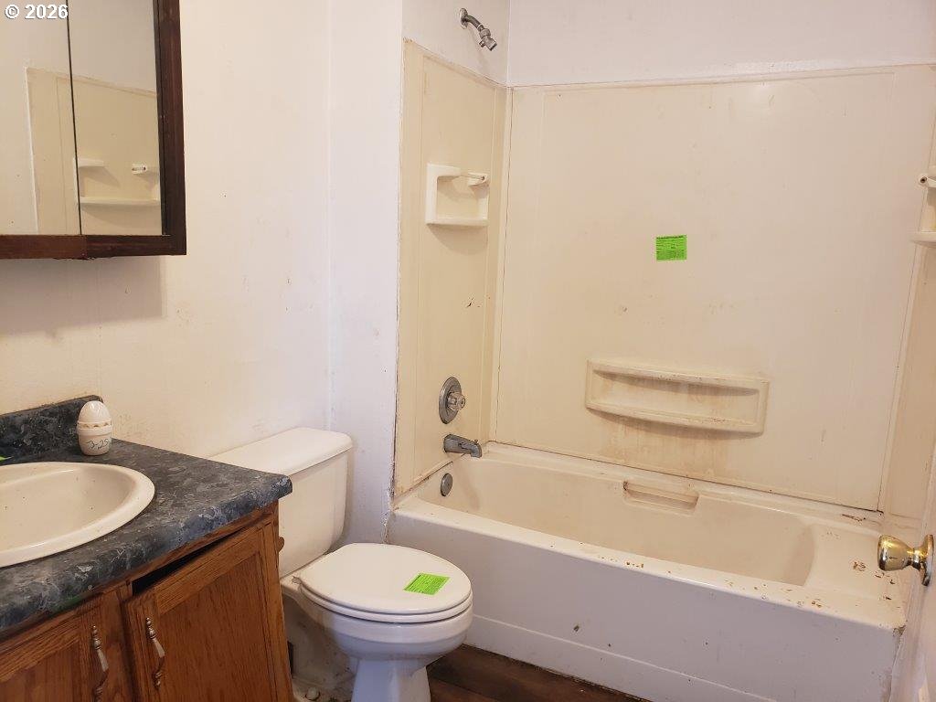 907 South College Street Joseph, OR 97846 - Photo 19 of 25 a bathroom with a granite countertop sink toilet and shower
