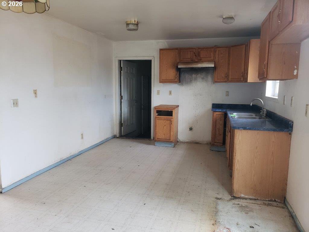 907 South College Street Joseph, OR 97846 - Photo 21 of 25 a kitchen with a sink and a stove