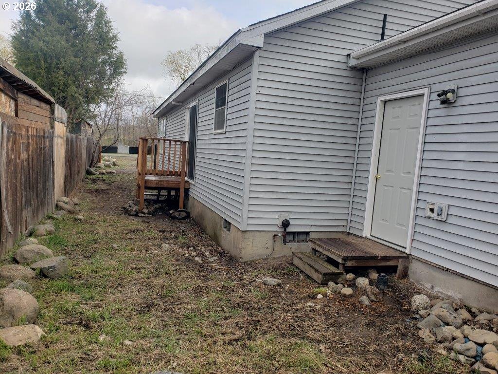 907 South College Street Joseph, OR 97846 - Photo 4 of 25 a backyard of a house with table and chairs