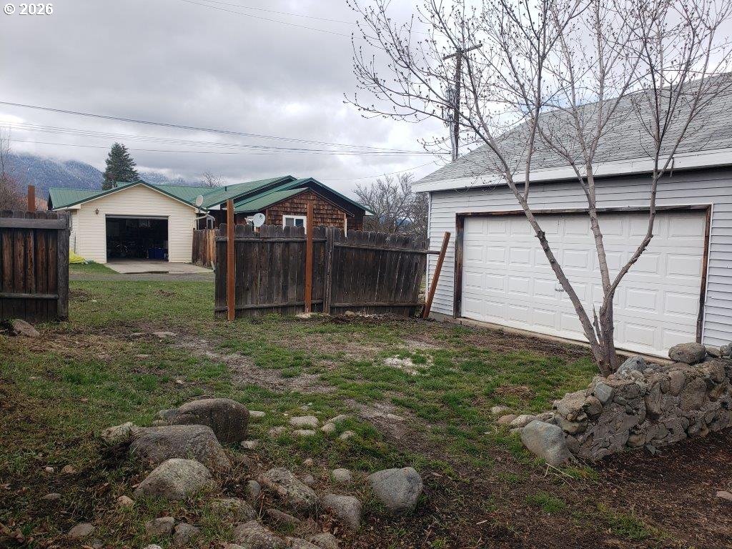 907 South College Street Joseph, OR 97846 - Photo 8 of 25 a house with lots of trees in the background