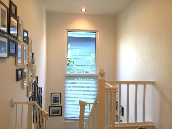 a view of a balcony and an entryway
