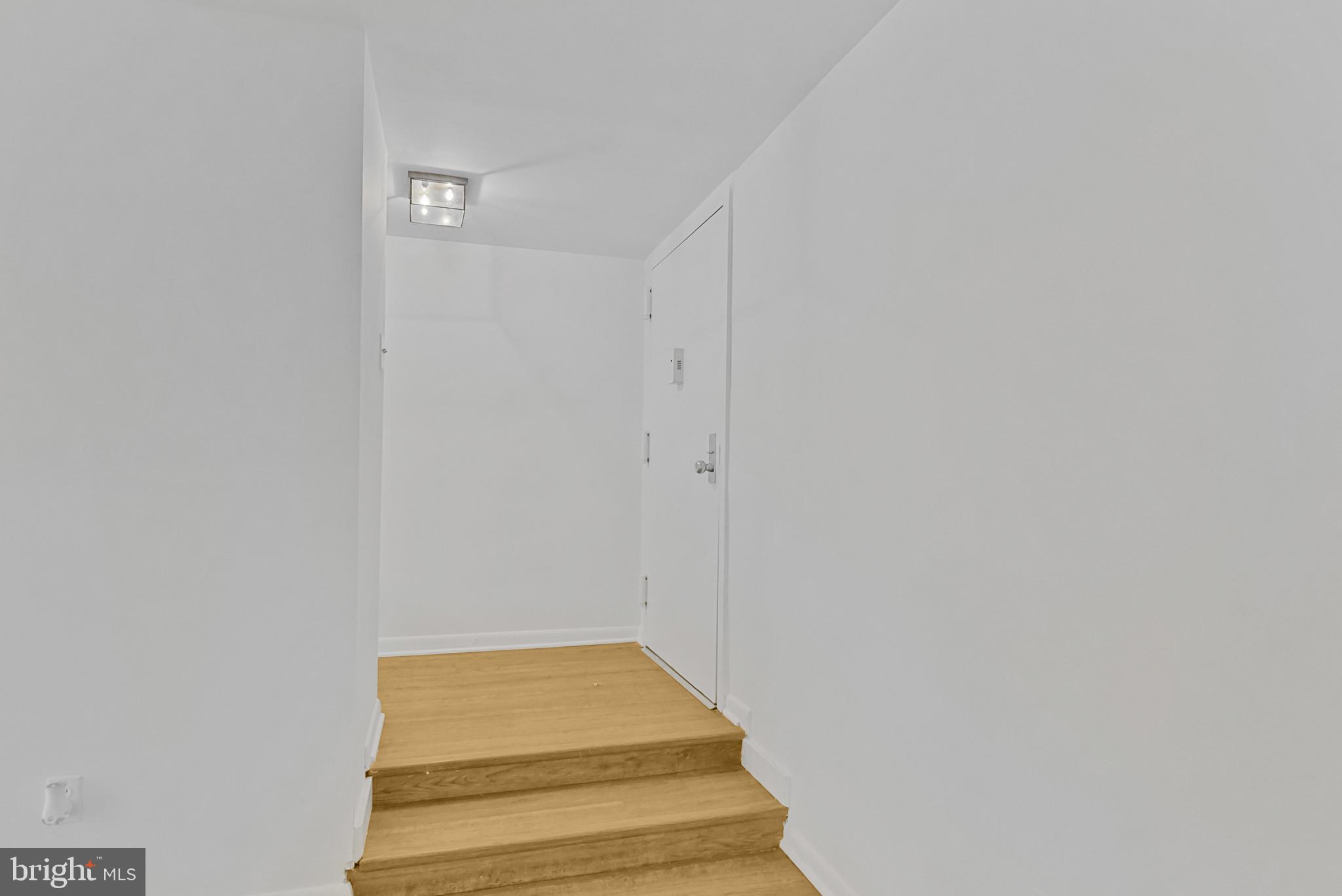 11212 Chestnut Grove Square, Unit 313 Reston, VA 20190 - Photo 17 of 22 a bathroom with a rug