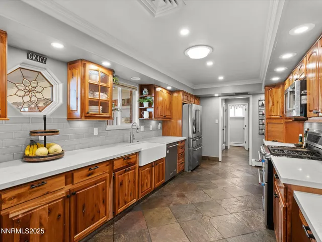 a view of living room with cabinets and flat screen tv