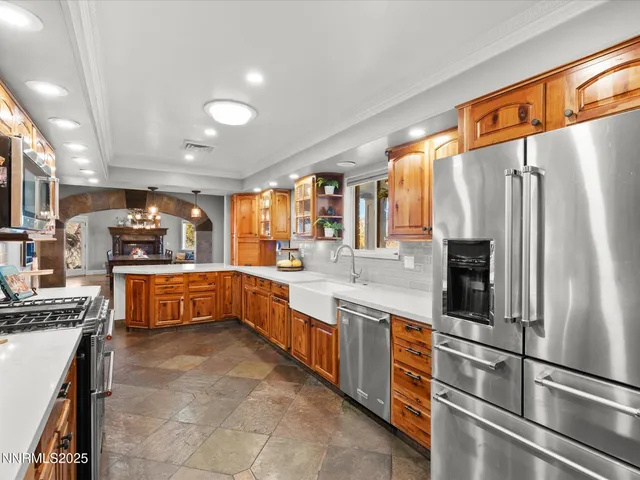 a utility room with sink dryer and washer