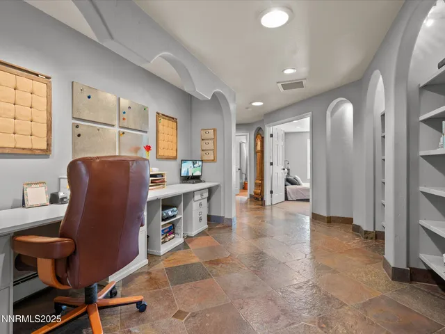 a bathroom with a double vanity sink a mirror and a window